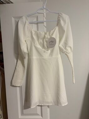 slim fit dress slacks FLARE SLEEVE FLOWY MINI DRESS – B ANN'S BOUTIQUE, LLC main image 0
